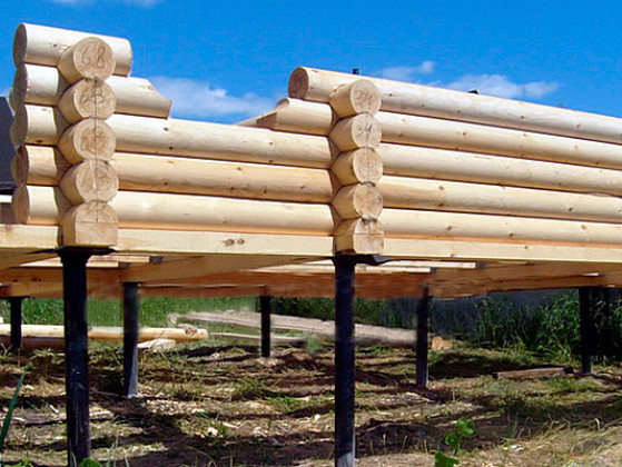 Фундамент на винтовых сваях для деревянного дома или бани